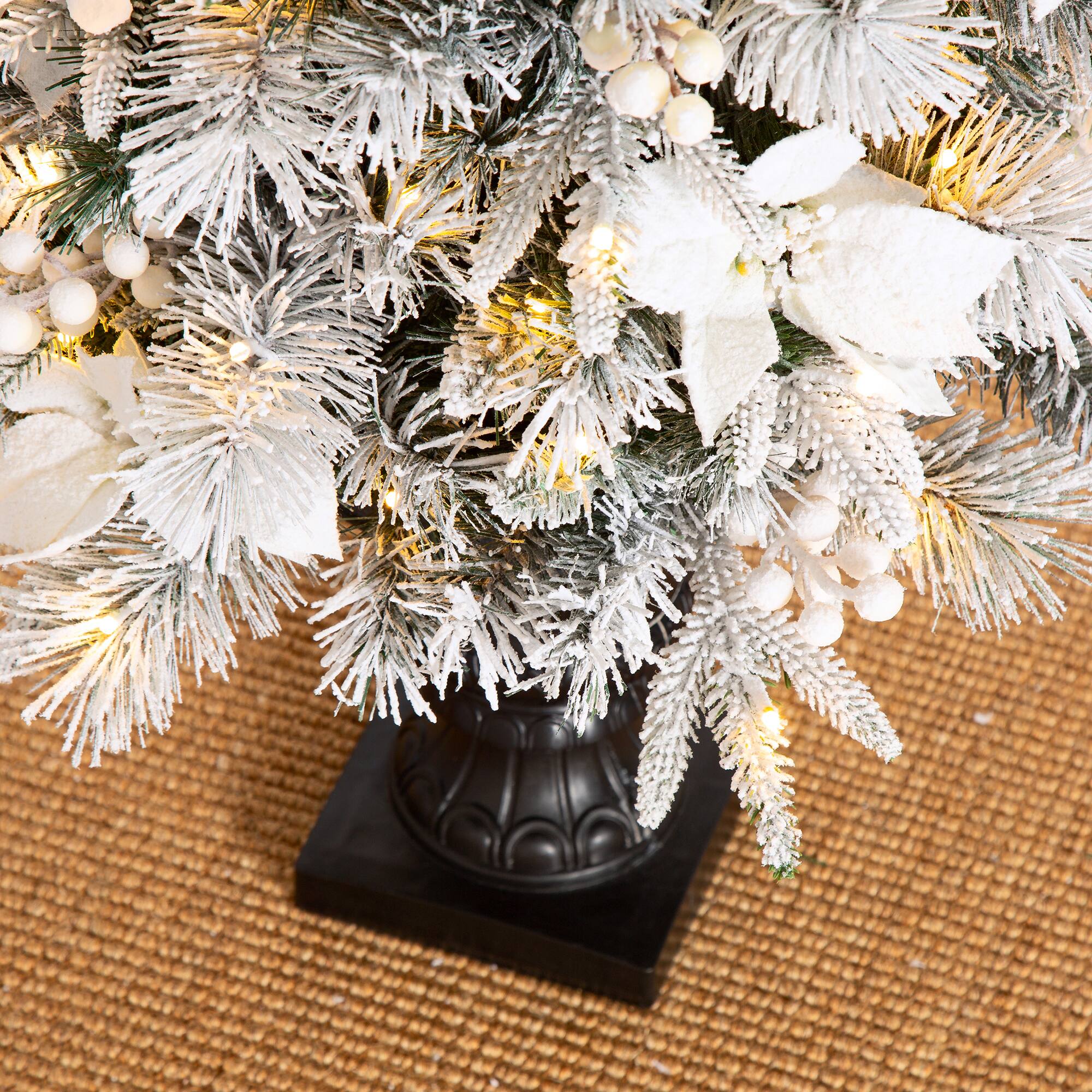 5ft. Pre-Lit Flocked Pine Artificial Christmas Tree in Planter, Warm White LED Lights